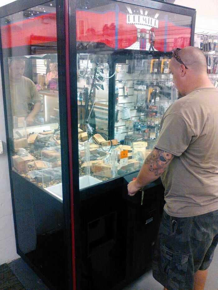 Gun Store Installs Claw Machine Full Of Ar Parts And Ammo Pictures 002