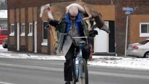 Guy Carries His Deer To The Butcher On His Bicycle video featured