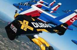 Threemenflywithjetpacksinaformationwithjetsfeatured