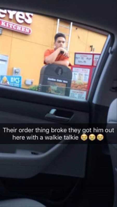 guy standing by the drive through