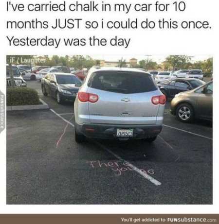 writing in parking lot with chalk