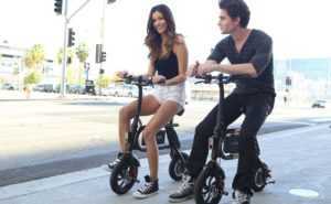 Two Models Posing On the SwagCycle