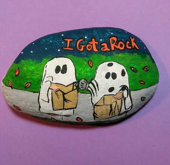 halloween painted rocks  two ghosts trick or treating and got a rock