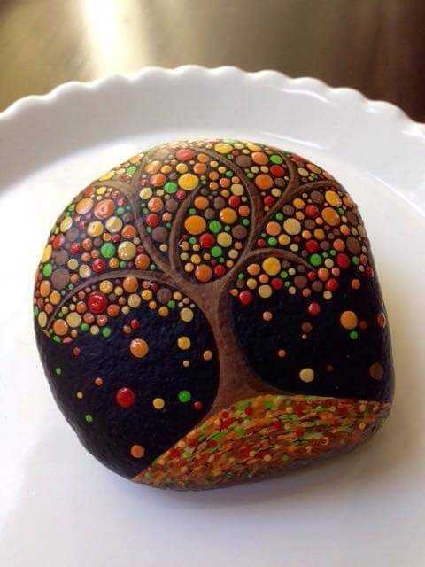 halloween and fall themed painted rocks  tree dropping candies