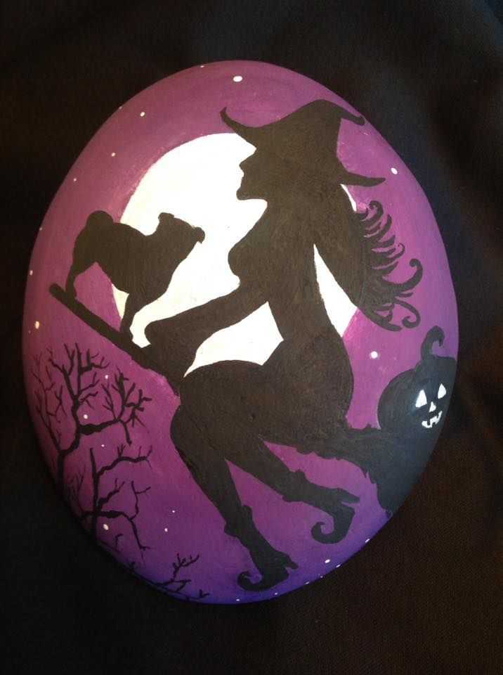 halloween rock painting  witch on a broom stick