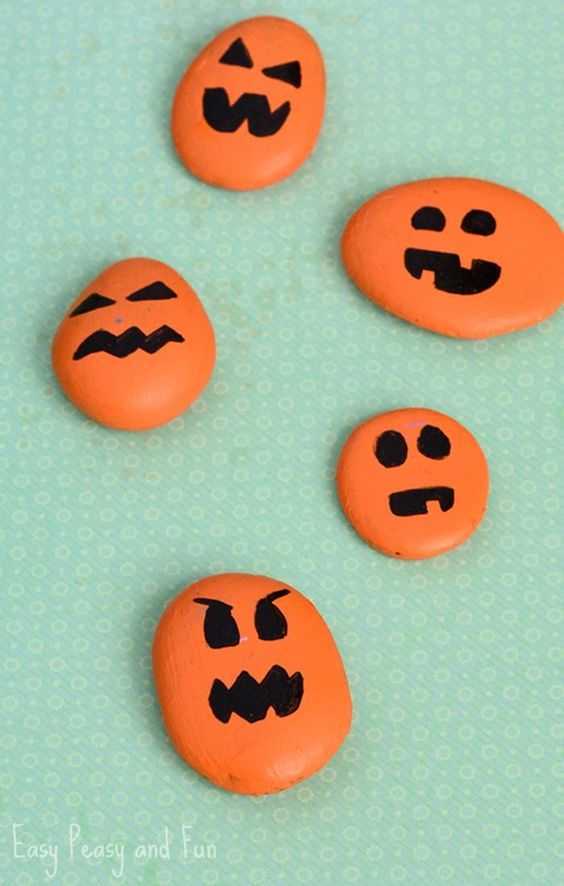 halloween painted rocks  simple jackolanterns