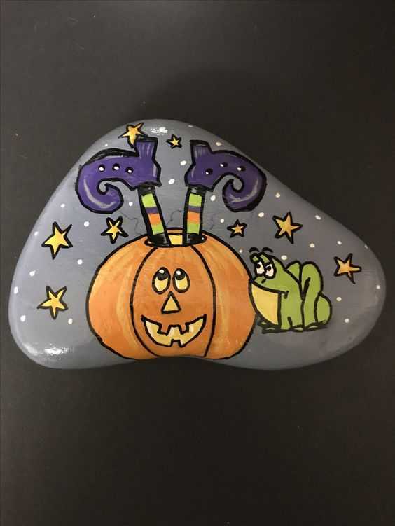 halloween painted rocks  jack o lantern with frog