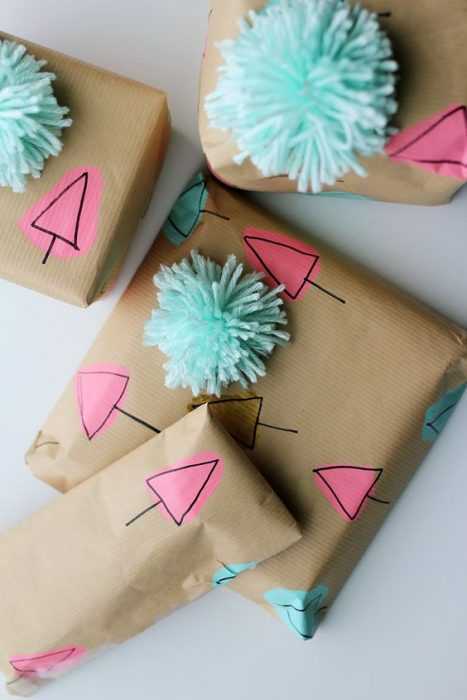 Cut up some yarn to make a pompom  DIY Gift Wrapping