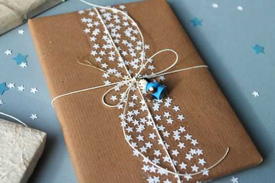 DIY Gift Wrapping  star hole punch to dress up some boring brown wrapping paper