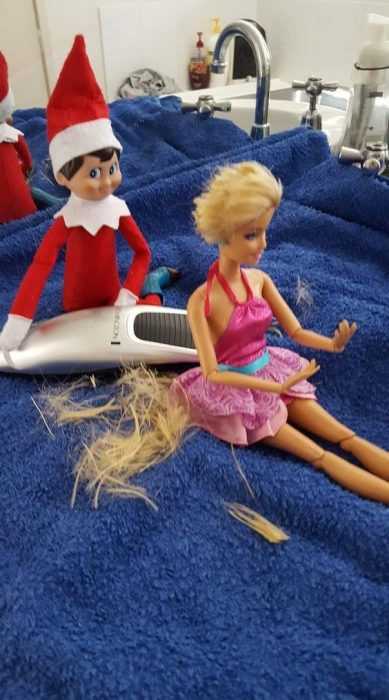 clever elf on the shelf ideas  gave barbie a hair cut