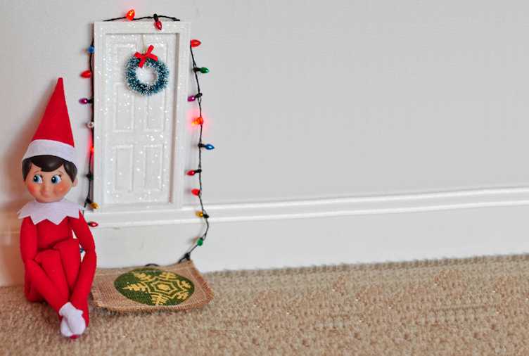 clever elf on the shelf ideas  decorated his own door