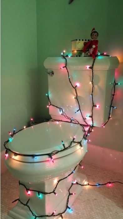 clever elf on the shelf ideas  decorated toilet