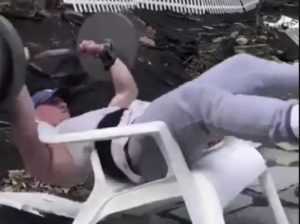quarantine workout fails  man benching on plastic chair