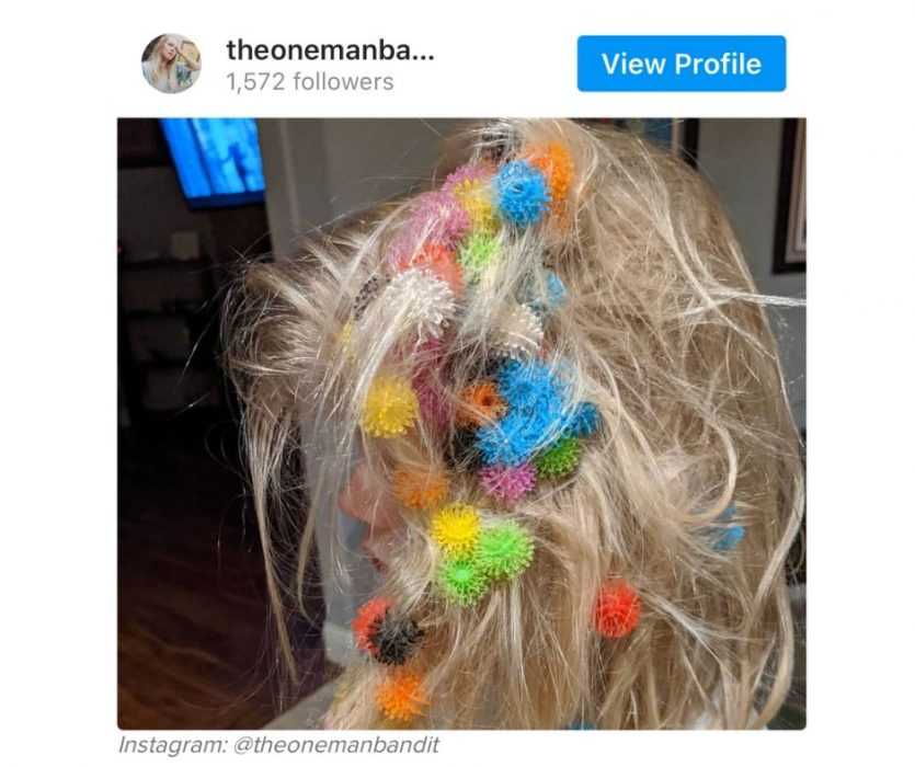 work-from-home-fail-3 work from home fails - child puts plastic coronavirus replicas in hair