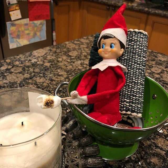 2020-Elf-On-The-Test 2020 Elf On The Shelf Ideas - Roasting Marshmallows Over Candle