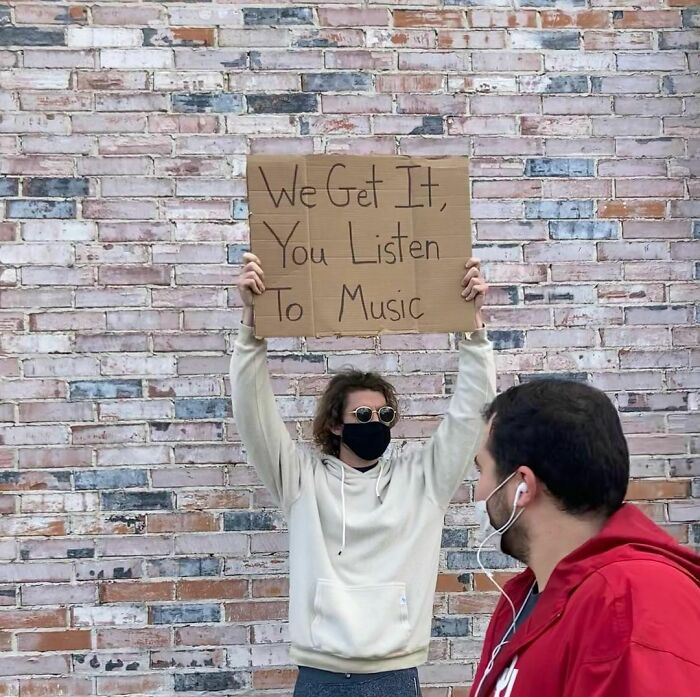 30 Hilarious Pictures Of A Man Protesting Obscure Things 