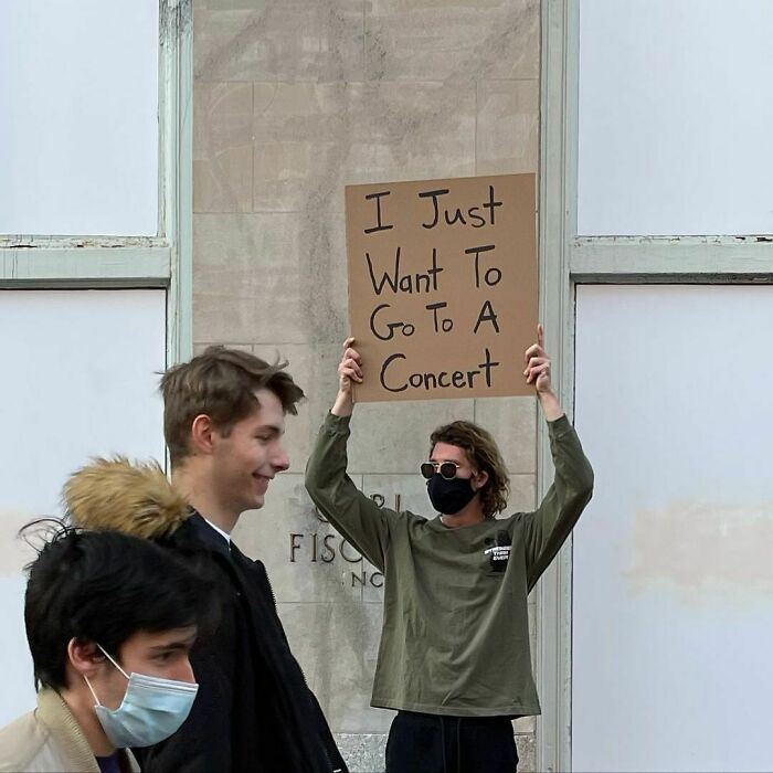 30 Hilarious Pictures Of A Man Protesting Obscure Things 