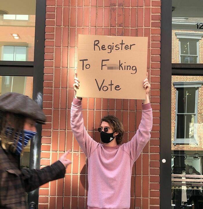 30 Hilarious Pictures Of A Man Protesting Obscure Things 